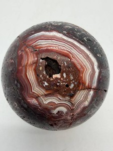 Polished Ocean Jasper Sphere With Orbicular Banding and Druzy