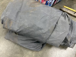 Large Tarp Good for Woodpile may have holes or rips