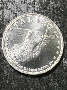 1 TROY OZ .999 FINE SILVER TALENT ROUND