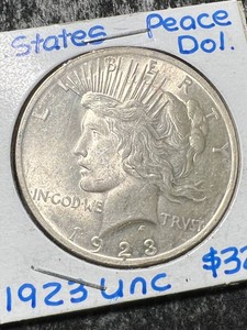 1923 US PEACE SILVER DOLLAR UNC