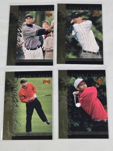 Lot of 4 Tiger Woods Rookie Golf Cards including Upper Deck Tigers Tales
