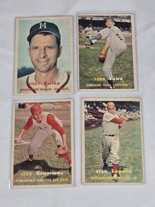 Lot of 4 Vintage 1957 Topps Baseball Cards Featuring Omar T. Low, Stanley E. Lopata, Andrew Pafko, and Alexander P. Grammas