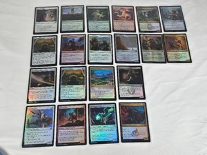Lot of 20 Magic The Gathering Foil Cards, Various Foil Editions including Fade into Antiquity, Scrapyard Steelbreaker, Light the Way, Ancestral Katana, Mandates Intervention, Automated Artificer