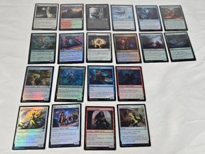 Lot of 20 FOIL Magic The Gathering Trading Cards including Luminous Phantom, Rugged Highlands, Mnemonic Sphere, Coiling Stalker, Imperial Subduer, Papercraft Decoy