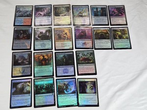 Lot of 10 Foil Magic The Gathering Cards including Swiftwater Cliffs, Resculpt, Introduction to Annihilation, Professor of Zoomancy, Silverquill Campus, Grapple with the Past