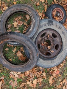 Lot of Assorted Vintage Auto Tires & Steel Wheels