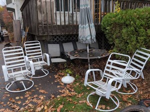 Mixed Patio Dining Set Glass Table, Umbrella, White Swivel,  Black Chairs