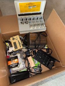 Box Lot of Vintage Electronics Chargers Clock Radio Speaker Accessories