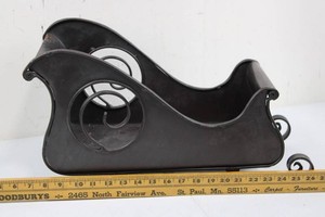 Black Metal Sleigh With Decorative Scrollwork